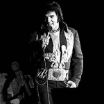 John Rowlands, Elvis' personal photographer up to his death in 1977. This picture is one of the most popular pictures Mr. Rowlands has taken of "The King"
